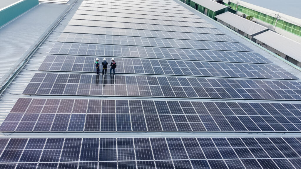 Commercial solar power - solar panels on large roof