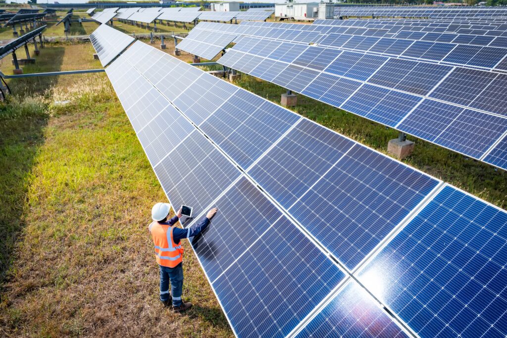 Commercial solar power panels on a field.